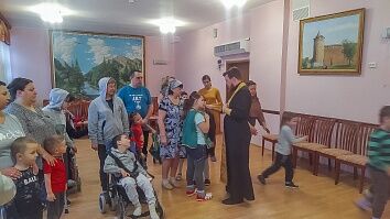 Причастие детей-инвалидов 