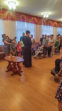 Причастие детей-инвалидов 