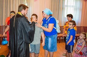 Причастие детей-инвалидов 