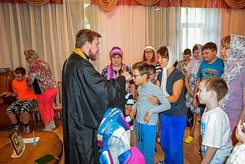 Причастие детей-инвалидов 