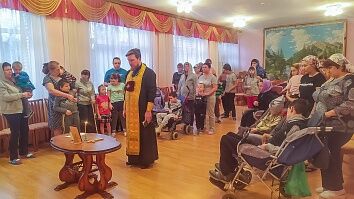 Причастие детей-инвалидов 